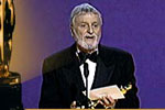Conrad Hall wins Best Cinematography at the Academy Awards